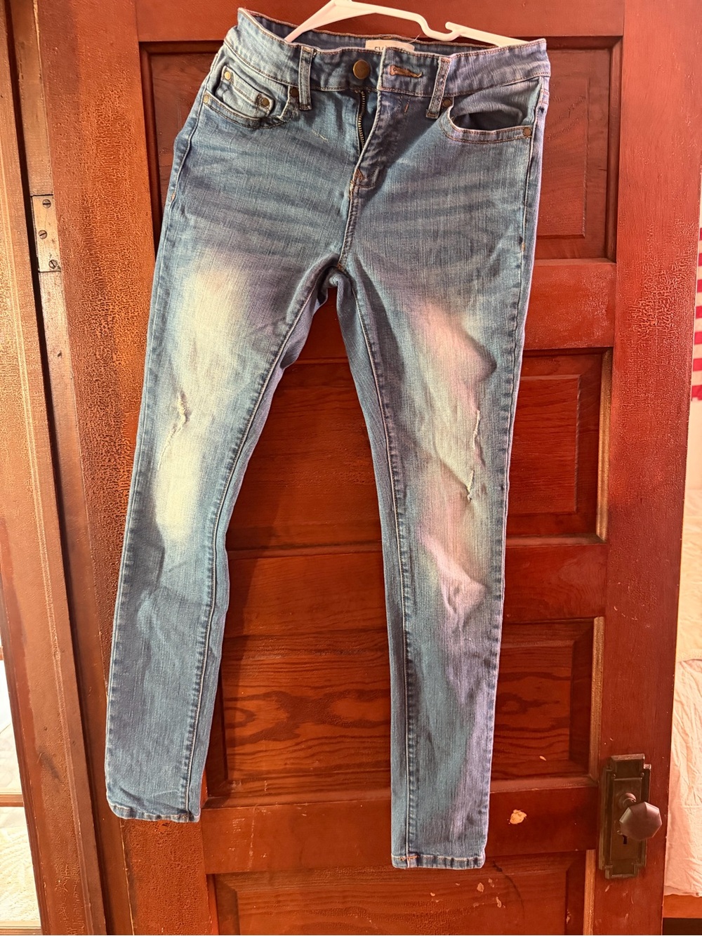 Women’s Skinny Jeans in Light Blue with Subtle Distressing